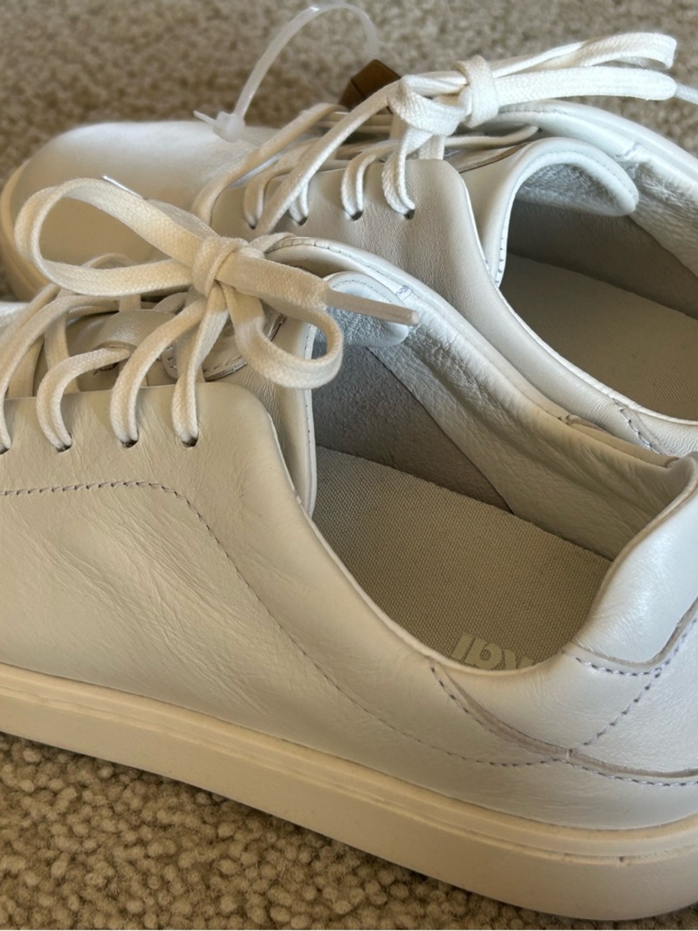 OluKai women’s All-White Leather Lace-Up Sneakers - Picture 6 of 6